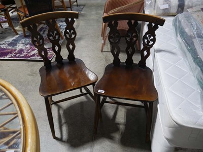 Lot 1243 - 2 wheelback type Ercol dining chairs