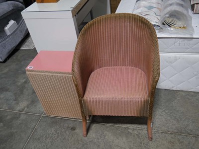 Lot 1260 - Lloyd Loom pink and gilt armchair with...