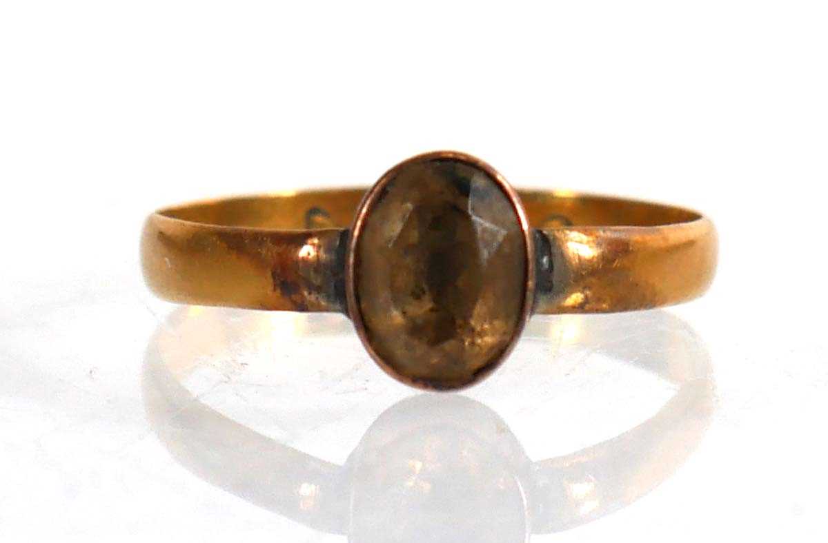 Lot 703 - A Victorian 22ct yellow gold wedding band,...