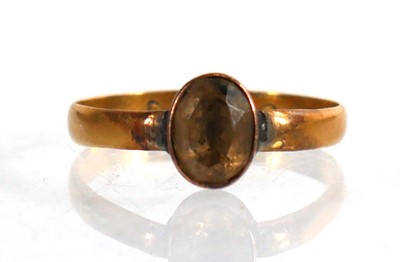 Lot 703 - A Victorian 22ct yellow gold wedding band,...