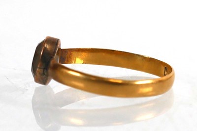 Lot 703 - A Victorian 22ct yellow gold wedding band,...