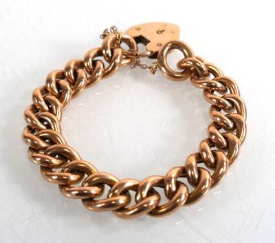 Lot 718 - A 9ct yellow gold hollow curblink bracelet...