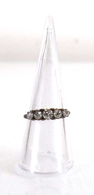 Lot 721 - An 18ct white gold ring set five gradated...