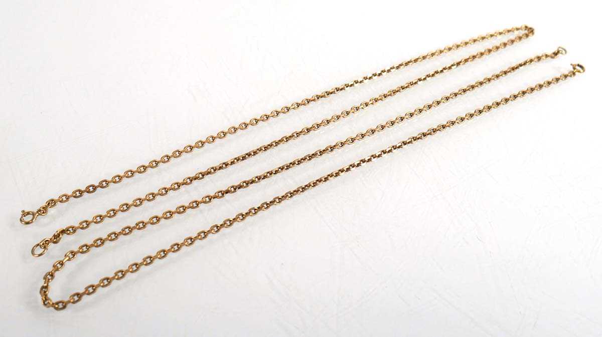 Lot 723 - A pair of 9ct yellow gold chainlink necklaces,...