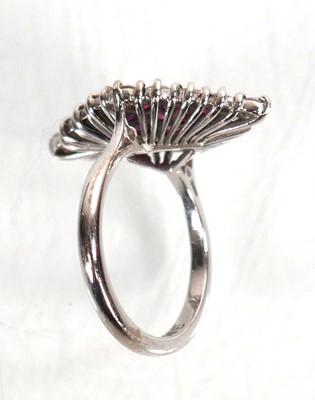 Lot 735 - An 18ct white gold cocktail ring set sixteen...