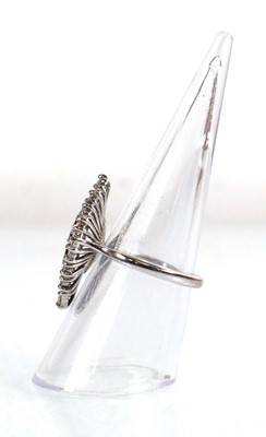 Lot 735 - An 18ct white gold cocktail ring set sixteen...