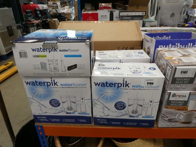 Lot 3104 - 5 Waterpik water flossers