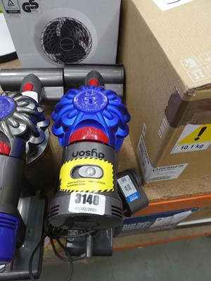 Lot 3148 - Hand held Dyson with charger and attachment