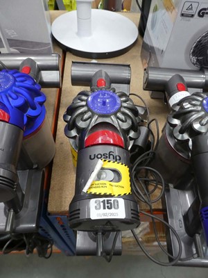 Lot 3150 - Hand held Dyson with charger and attachment