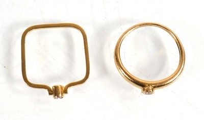 Lot 745 - Two 18ct yellow gold rings, each set a small...