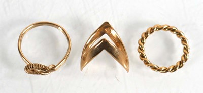 Lot 748 - Three 9ct yellow gold rings comprising a...