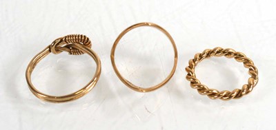 Lot 748 - Three 9ct yellow gold rings comprising a...