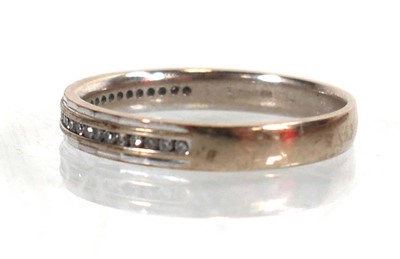 Lot 762 - A 9ct white gold half eternity ring set small...