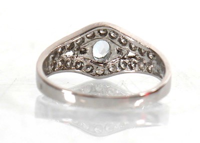 Lot 767 - A 9ct white gold ring set pale blue stone and...