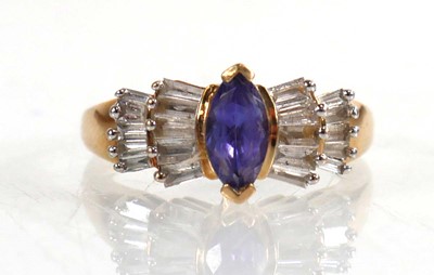 Lot 771 - A 9ct yellow gold ring set marquise cut...