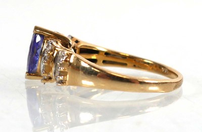 Lot 771 - A 9ct yellow gold ring set marquise cut...