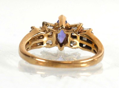 Lot 771 - A 9ct yellow gold ring set marquise cut...