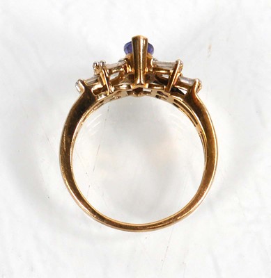 Lot 771 - A 9ct yellow gold ring set marquise cut...