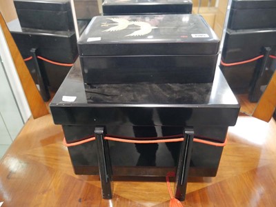 Lot 1505 - Black lacquered storage box and a similar...