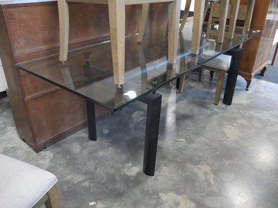 Lot 1511 - Substantial rectangular glass dining table on...