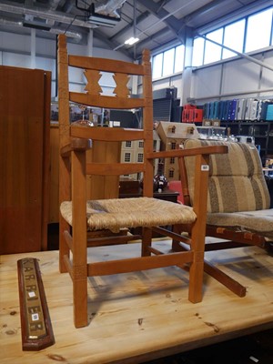 Lot 1577 - Pine high back armchair with rush seat