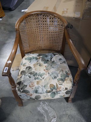 Lot 1582 - Dark oak bergère backed nursery chair with...