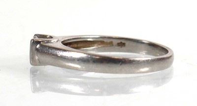 Lot 789 - A platinum ring set brilliant cut diamond in a...