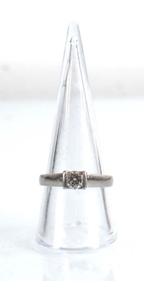 Lot 789 - A platinum ring set brilliant cut diamond in a...