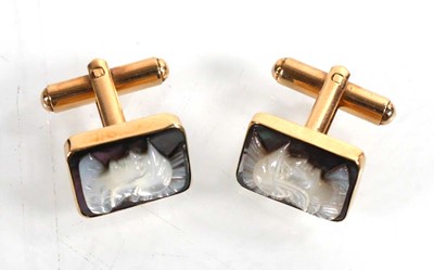 Lot 790 - A pair of 14ct yellow gold cufflinks, each set...