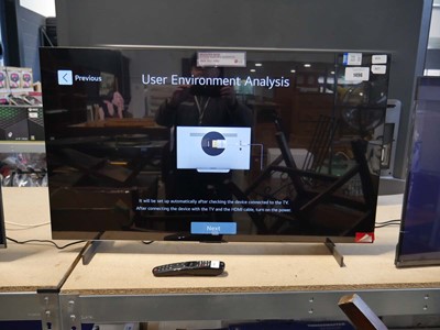 Lot 1496 - 42" LG OLED TV with stand, remote and box...