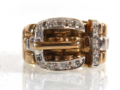 Lot 826 - A 9ct yellow gold buckle ring set small...