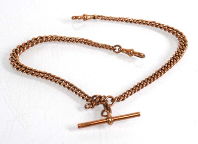 Lot 830 - A 9ct rose gold double Albert watch chain with...