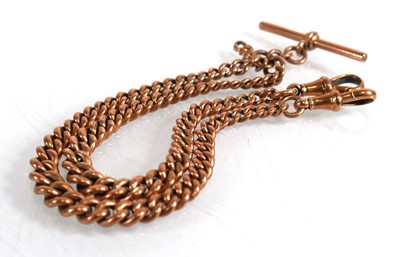 Lot 830 - A 9ct rose gold double Albert watch chain with...