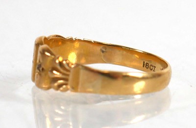 Lot 836 - An 18ct yellow gold ring set three small...