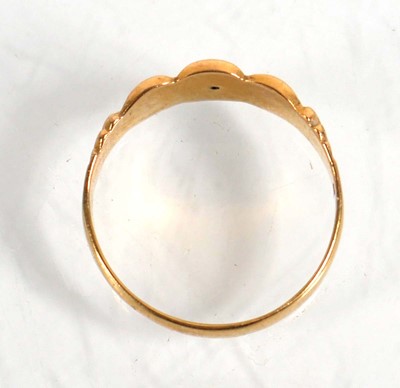 Lot 836 - An 18ct yellow gold ring set three small...