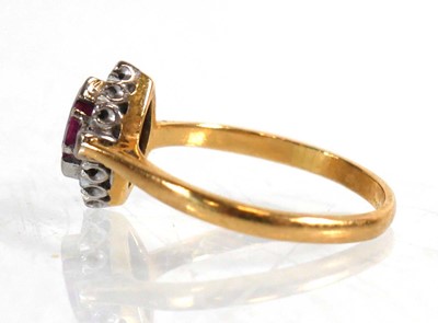 Lot 838 - An 18ct yellow gold cluster ring set marquise...