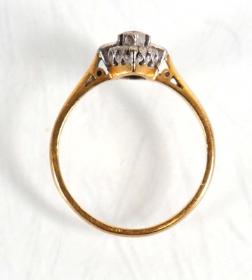 Lot 838 - An 18ct yellow gold cluster ring set marquise...