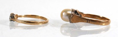 Lot 840 - A yellow metal ring set cultured pearl and two...