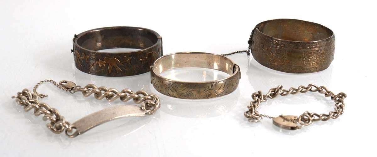 Lot 843 - A group of silver and metalware bracelets...