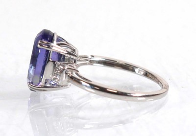 Lot 848 - A 14ct white gold ring set oval tanzanite...