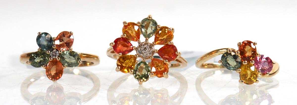 Lot 855 - Three 9ct yellow gold cluster rings, each set...