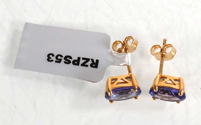 Lot 875 - A pair of 18ct yellow gold ear studs, each set...