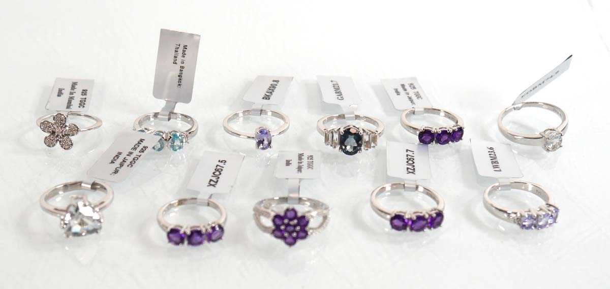 Lot 901 - Eleven modern silver rings set white, purple...