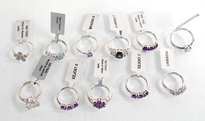 Lot 901 - Eleven modern silver rings set white, purple...