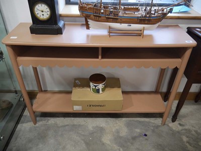 Lot 1120 - Modern pink sideboard with lower shelf