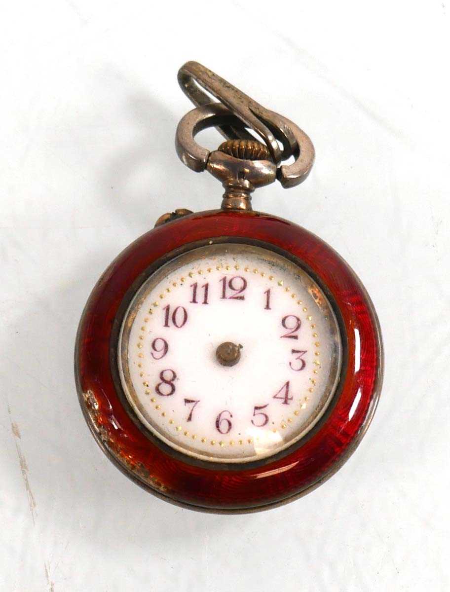 Lot 460 - A ladies silver fob watch, the white enamel...