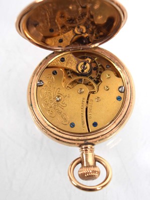 Lot 467 - A gold plated open face fob watch by Waltham,...