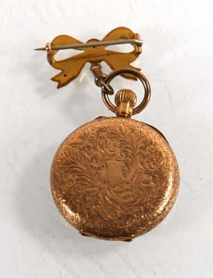 Lot 469 - A 14ct yellow gold open face fob watch, the...