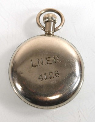 Lot 472 - A base metal open face pocket watch by Record,...