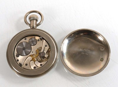 Lot 472 - A base metal open face pocket watch by Record,...